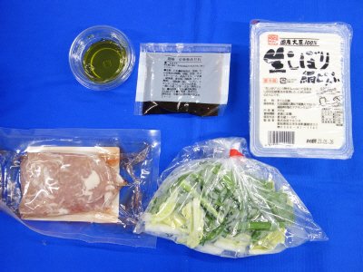 産直豚肉とくずし豆腐の旨煮あんかけ（花椒油付き）